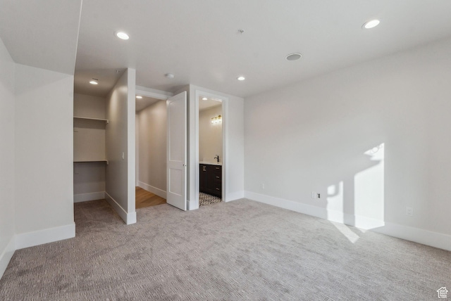 3097 E Corral Peak Cir Unit 145, Heber City, UT 84032 - unfurnished bedroom with baseboards, recessed lighting, and carpet flooring
