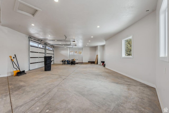 3097 E Corral Peak Cir Unit 145, Heber City, UT 84032 - garage featuring baseboards and recessed lighting