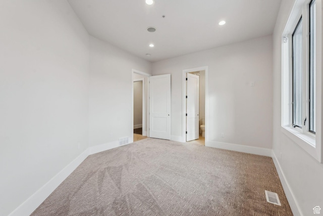 3097 E Corral Peak Cir Unit 145, Heber City, UT 84032 - unfurnished bedroom featuring visible vents, baseboards, recessed lighting, and carpet flooring