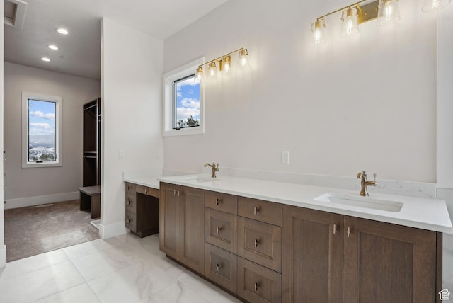 3097 E Corral Peak Cir Unit 145, Heber City, UT 84032 - bathroom with recessed lighting, a sink, and a wealth of natural light