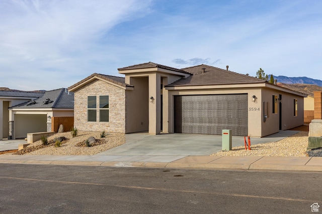 3594 W 185 N, Hurricane, UT 84737 - view of front of house with a mountain view and a garage