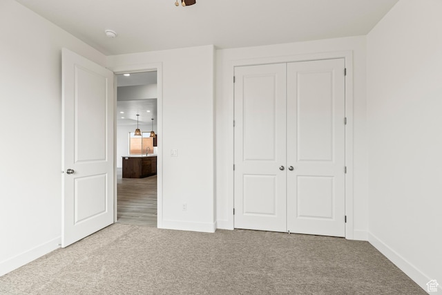 3594 W 185 N, Hurricane, UT 84737 - unfurnished bedroom featuring carpet flooring and a closet