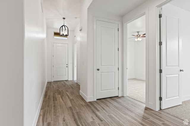 3594 W 185 N, Hurricane, UT 84737 - hall featuring a notable chandelier and light hardwood / wood-style flooring