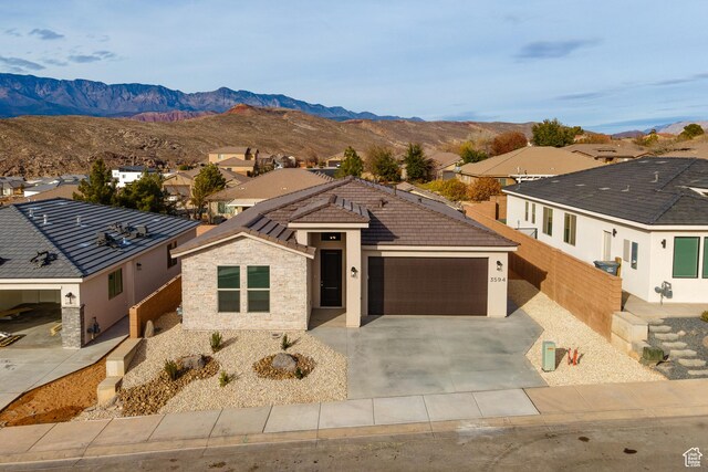 3594 W 185 N, Hurricane, UT 84737 - view of front facade with a mountain view and a garage