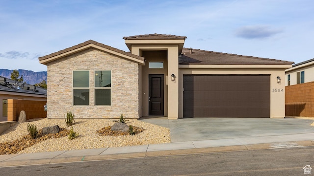 3594 W 185 N, Hurricane, UT 84737 - view of front of home with a mountain view and a garage