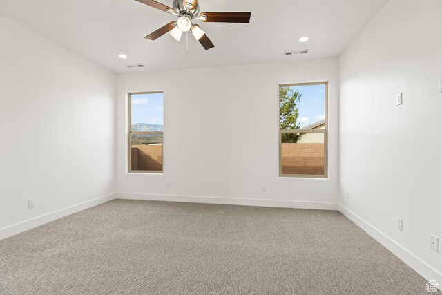 3594 W 185 N, Hurricane, UT 84737 - carpeted spare room with a wealth of natural light and ceiling fan