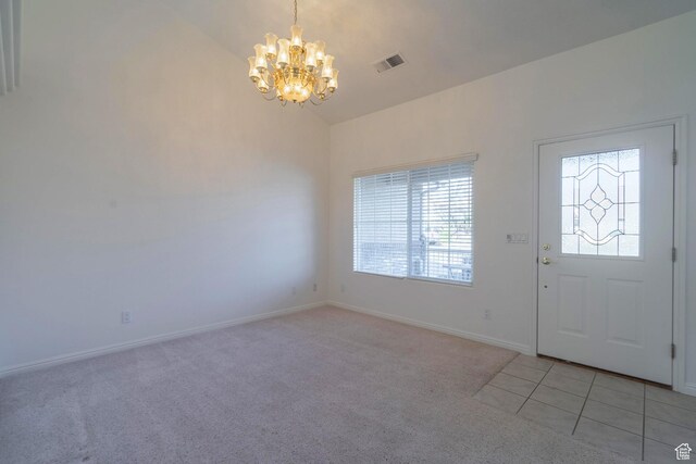 3423 Red Butte Dr, Santa Clara, UT 84765 - entrance foyer with baseboards, visible vents, an inviting chandelier, lofted ceiling, and light carpet