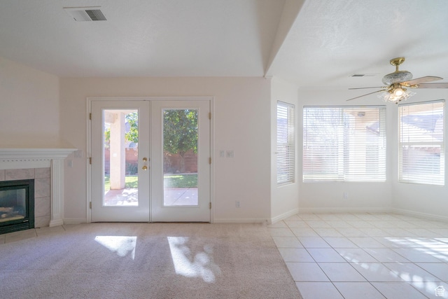 3423 Red Butte Dr, Santa Clara, UT 84765 - unfurnished living room featuring a ceiling fan, a healthy amount of sunlight, and visible vents