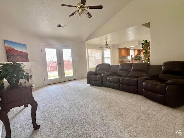 3423 Red Butte Dr, Santa Clara, UT 84765 - living room with visible vents, high vaulted ceiling, ceiling fan, a textured ceiling, and light colored carpet