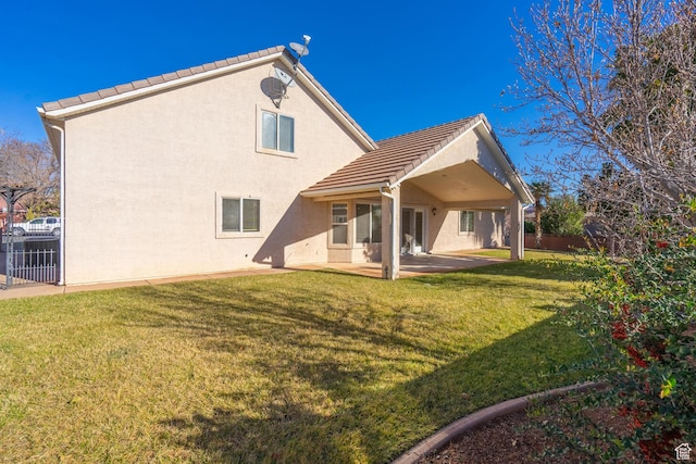 3423 Red Butte Dr, Santa Clara, UT 84765 - back of property featuring a patio area, stucco siding, a tiled roof, and fence