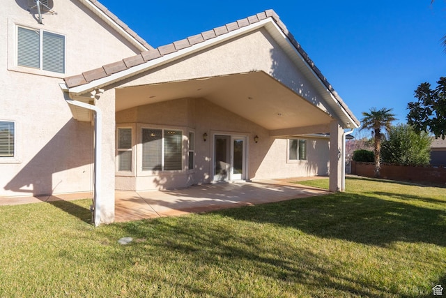 3423 Red Butte Dr, Santa Clara, UT 84765 - back of house with a patio area, a lawn, and stucco siding