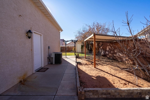 3423 Red Butte Dr, Santa Clara, UT 84765 - view of yard featuring a patio area, cooling unit, and fence