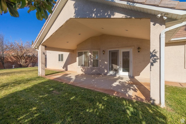 3423 Red Butte Dr, Santa Clara, UT 84765 - back of property with a patio, a yard, and stucco siding