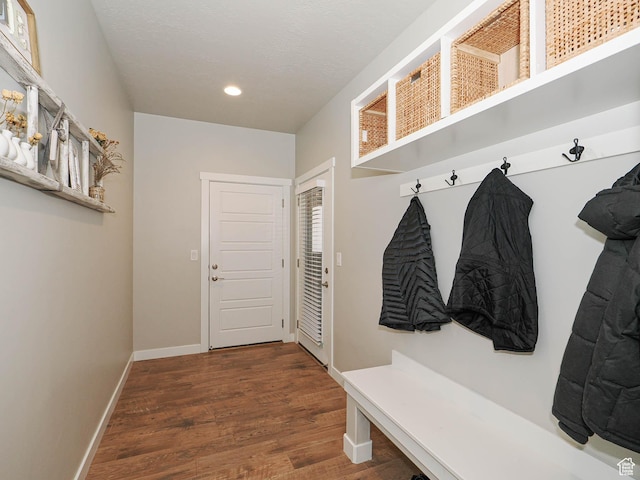 mudroom with wood finished floors, baseboards, and recessed lighting