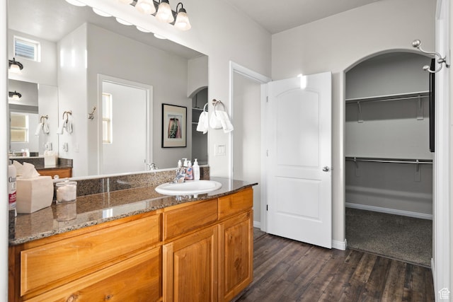 2468 S Dorothy St, Hurricane, UT 84737 - bathroom featuring hardwood / wood-style flooring and vanity