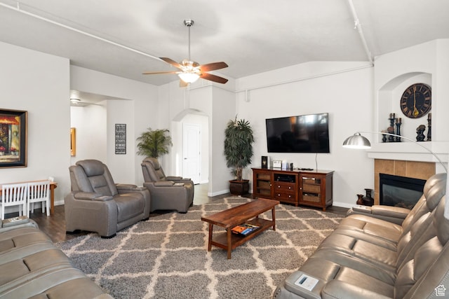 2468 S Dorothy St, Hurricane, UT 84737 - living room featuring ceiling fan, lofted ceiling, and a tiled fireplace