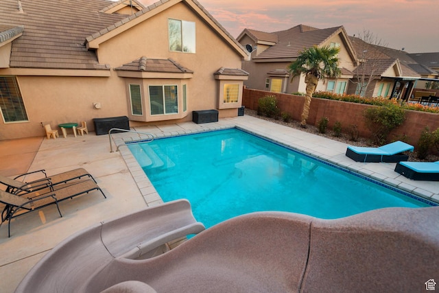 2468 S Dorothy St, Hurricane, UT 84737 - pool at dusk featuring a patio area