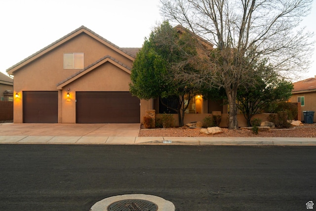 2468 S Dorothy St, Hurricane, UT 84737 - view of front facade featuring a garage