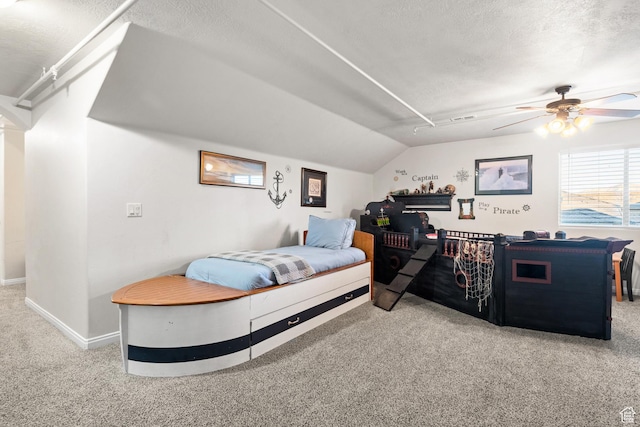 2468 S Dorothy St, Hurricane, UT 84737 - bedroom with a textured ceiling, ceiling fan, carpet floors, and vaulted ceiling