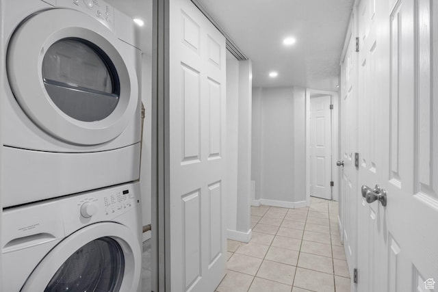 512 N 100 E, Orem, UT 84057 - laundry area featuring light tile patterned floors and stacked washer and clothes dryer