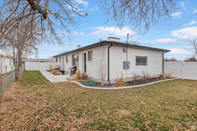 512 N 100 E, Orem, UT 84057 - rear view of house featuring a yard and a patio