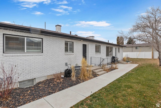 512 N 100 E, Orem, UT 84057 - view of front of property featuring cooling unit and a front yard