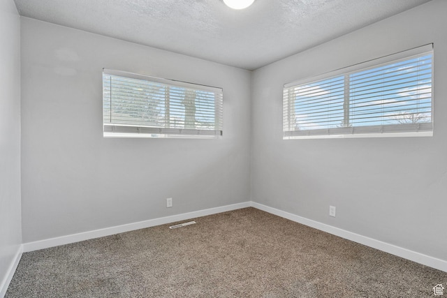 512 N 100 E, Orem, UT 84057 - empty room featuring carpet flooring and a textured ceiling