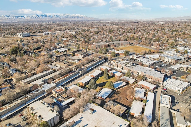 birds eye view of property featuring a mountain view