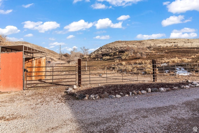 110 N 400 E, Glenwood, UT 84730 - view of yard featuring an exterior structure, a mountain view, a view of rural / pastoral area, and an outdoor structure