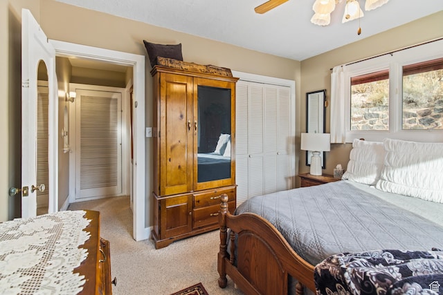 110 N 400 E, Glenwood, UT 84730 - bedroom featuring light colored carpet, a closet, a ceiling fan, and baseboards