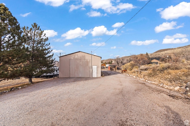 110 N 400 E, Glenwood, UT 84730 - view of dirt / gravel driveway featuring a mountain view and a gated entry