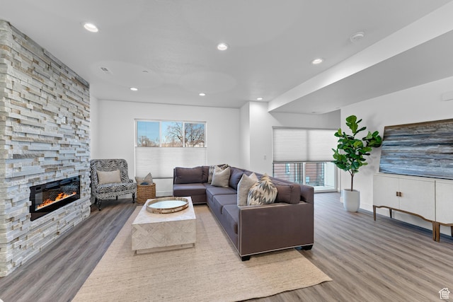 1618 S Main St Unit 3, Salt Lake City, UT 84115 - living room featuring hardwood / wood-style floors and a fireplace