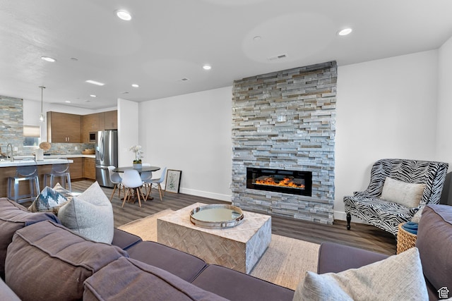 1618 S Main St Unit 3, Salt Lake City, UT 84115 - living room with hardwood / wood-style floors, a fireplace, and sink