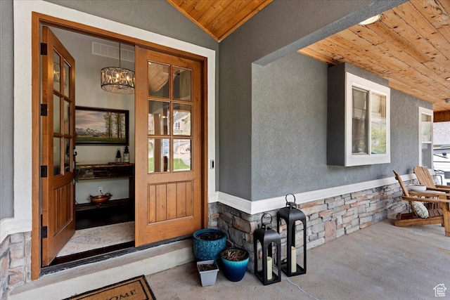 4147 N Wolf Ridge Cir, Eden, UT 84310 - doorway to property featuring a porch