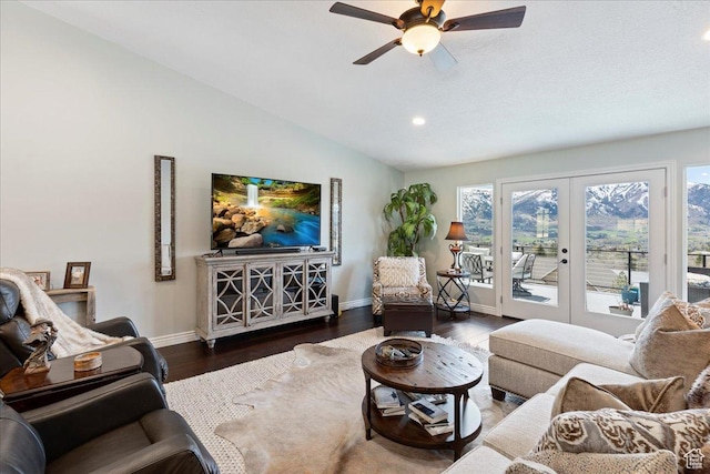 4147 N Wolf Ridge Cir, Eden, UT 84310 - living room with vaulted ceiling, ceiling fan, french doors, and dark hardwood / wood-style floors