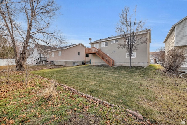 256 Bubbling Brook Ln, Draper, UT 84020 - back of property featuring a yard and a deck