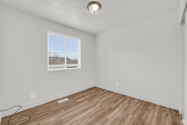 256 Bubbling Brook Ln, Draper, UT 84020 - unfurnished room with light hardwood / wood-style floors