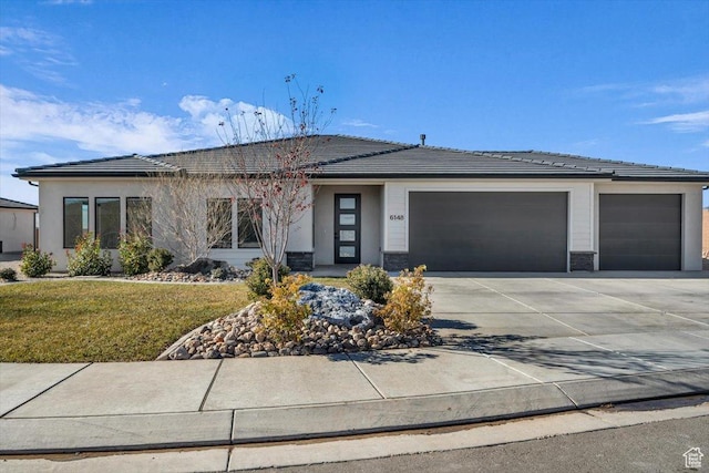 6148 S Square Top Ln, St George, UT 84790 - prairie-style home with a front lawn and a garage