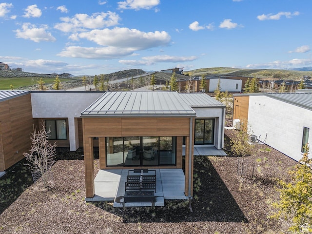 6242 Double Deer Loop, Park City, UT 84098 - back of property featuring a standing seam roof, metal roof, and a mountain view