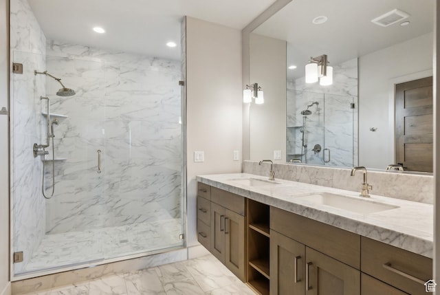 6242 Double Deer Loop, Park City, UT 84098 - bathroom with marble look tile flooring, a marble finish shower, recessed lighting, and double vanity