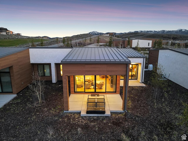6242 Double Deer Loop, Park City, UT 84098 - back of house with a standing seam roof, metal roof, and a mountain view