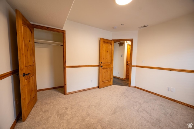 5063 E Lakeview Dr Unit 1009, Eden, UT 84310 - unfurnished bedroom featuring a closet and light colored carpet