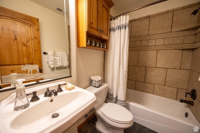 5063 E Lakeview Dr Unit 1009, Eden, UT 84310 - full bathroom featuring shower / bath combo with shower curtain, sink, and toilet