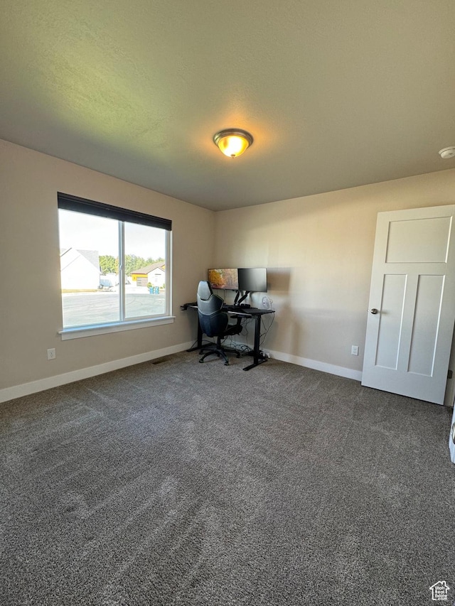 view of carpeted office space