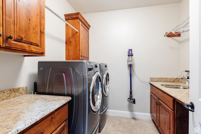 437 N Northstar Dr, St George, UT 84770 - laundry area featuring cabinets, separate washer and dryer, sink, and light tile patterned floors