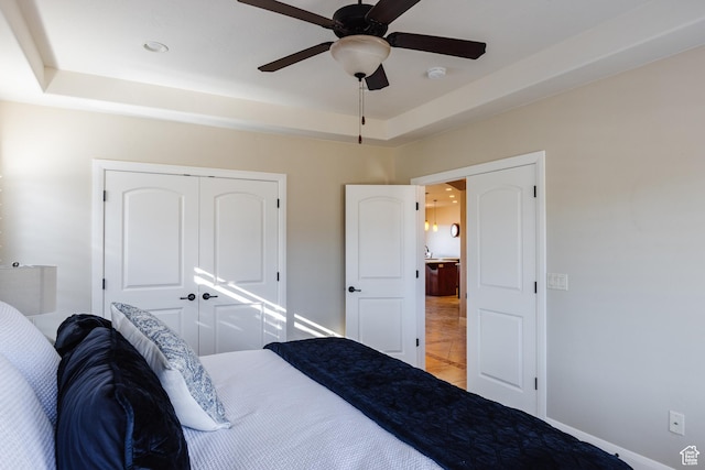 437 N Northstar Dr, St George, UT 84770 - bedroom with ceiling fan, a raised ceiling, and a closet