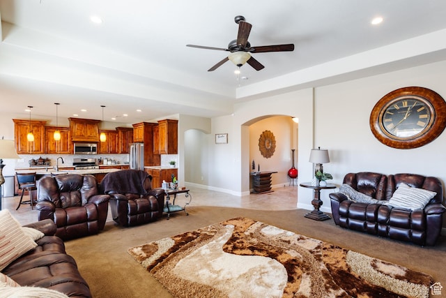 437 N Northstar Dr, St George, UT 84770 - carpeted living room with ceiling fan and sink