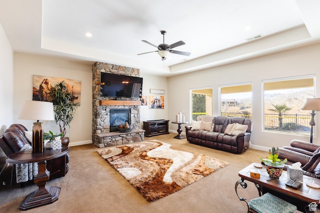 437 N Northstar Dr, St George, UT 84770 - living room with ceiling fan, light colored carpet, a fireplace, and a raised ceiling