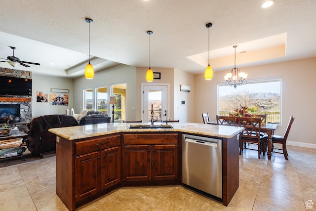 437 N Northstar Dr, St George, UT 84770 - kitchen with a raised ceiling, sink, stainless steel dishwasher, and a kitchen island with sink