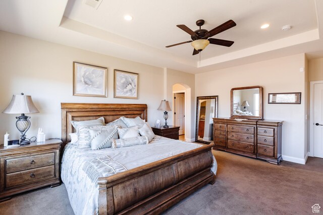 437 N Northstar Dr, St George, UT 84770 - carpeted bedroom featuring a raised ceiling and ceiling fan